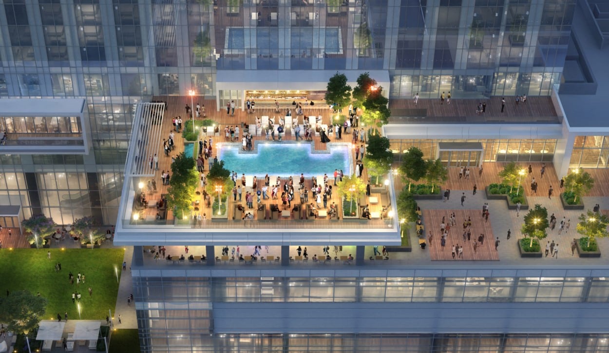 View of Signia Hilton rooftop saltwater pool and deck with cocktail party